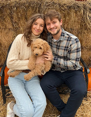 Matej, his wife Nika and their dog Maple