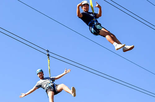 2 men on zipline