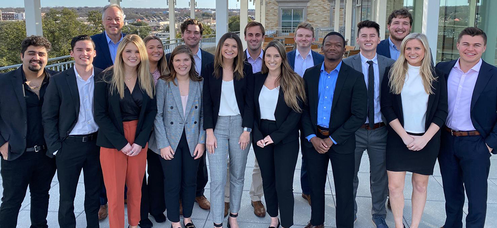 Section Image: Sales Certificate students on the roof of the Neeley School 