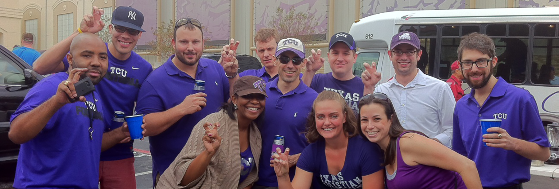 Section Image: Graduate students at a tailgate 