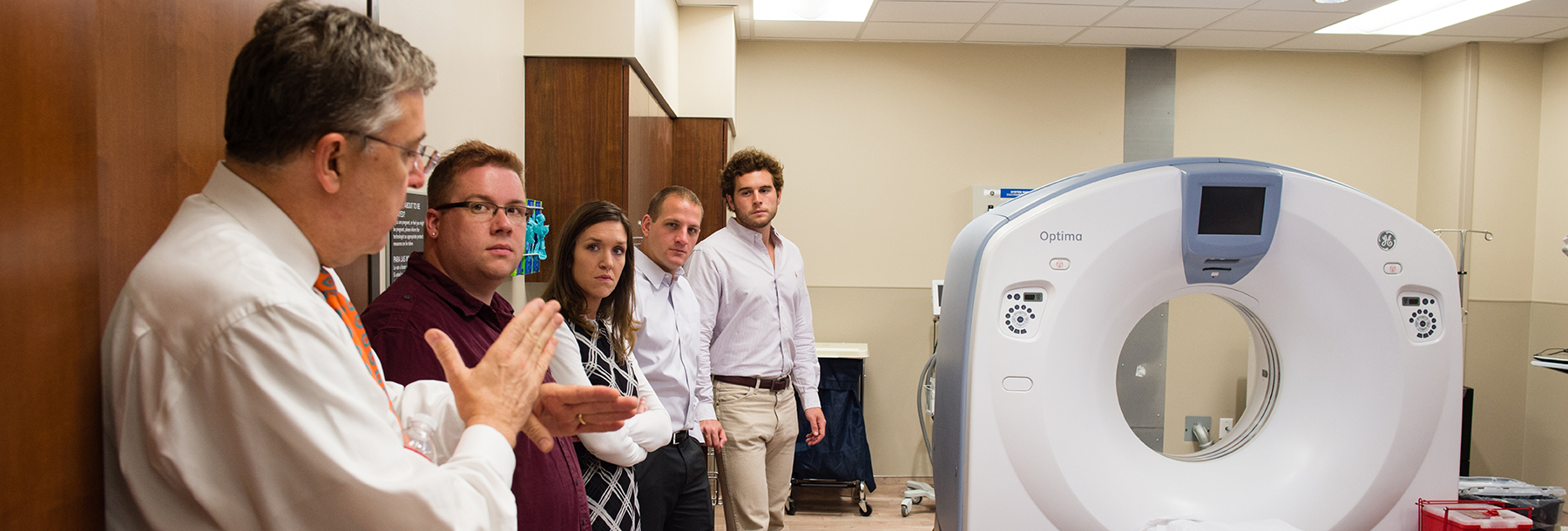 Section Image: Students with teacher in CT scan room 
