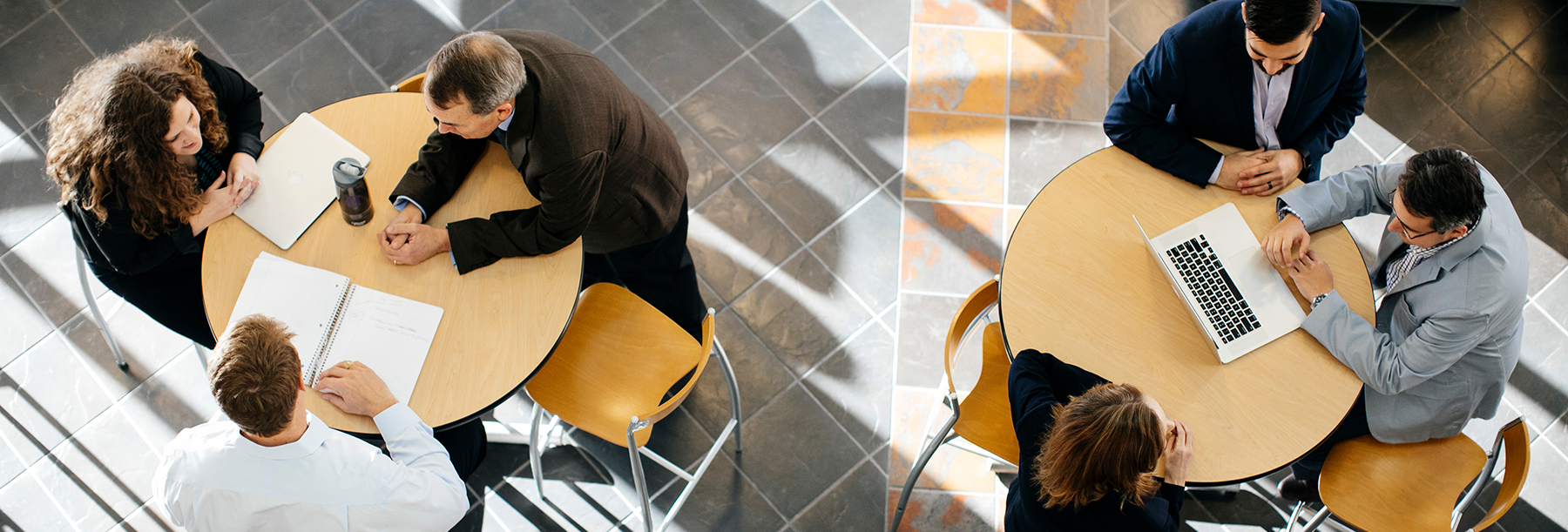 Section Image: People at round tables in Smith atrium 