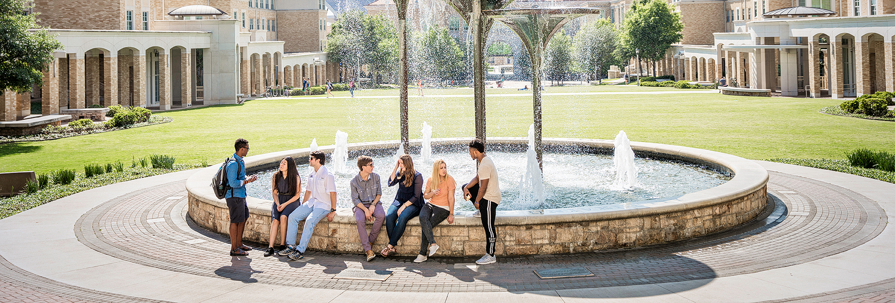 Section Image: Students at Frog Fountain in the center of campus. 