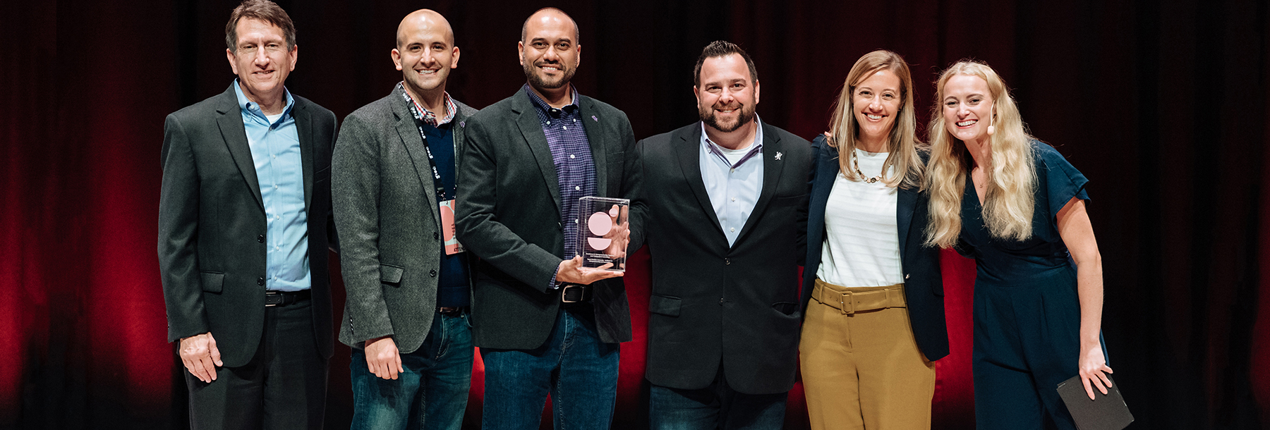 Section Image: Entrepreneurship Faculty with award 