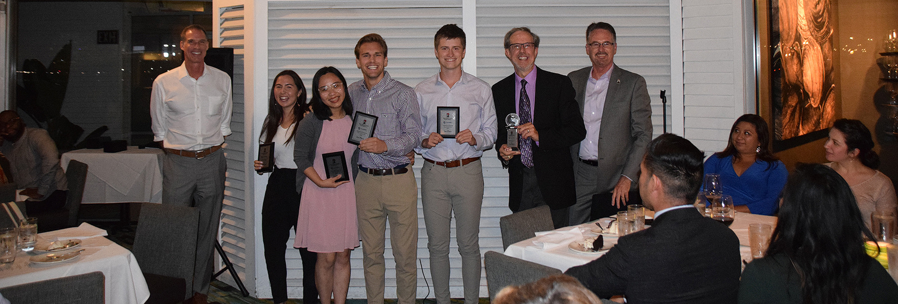 Section Image: TCU Team with trophies 