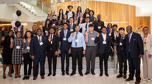 Section Image: Students in ACAP tshirts by fountain 