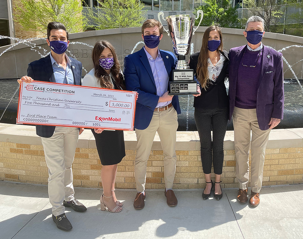 Big 12 Winning team with check and trophy