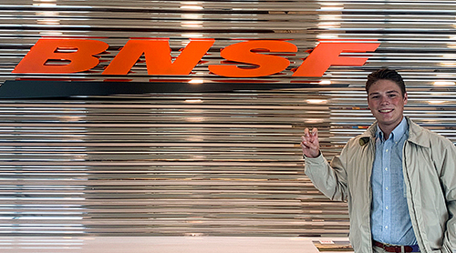 Section Image: Caleb Jerome with BNSF sign 