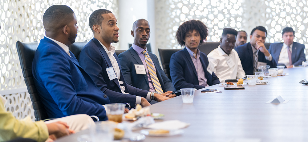 Sekou Lewis joins Neeley students for lunch in the Board Room.