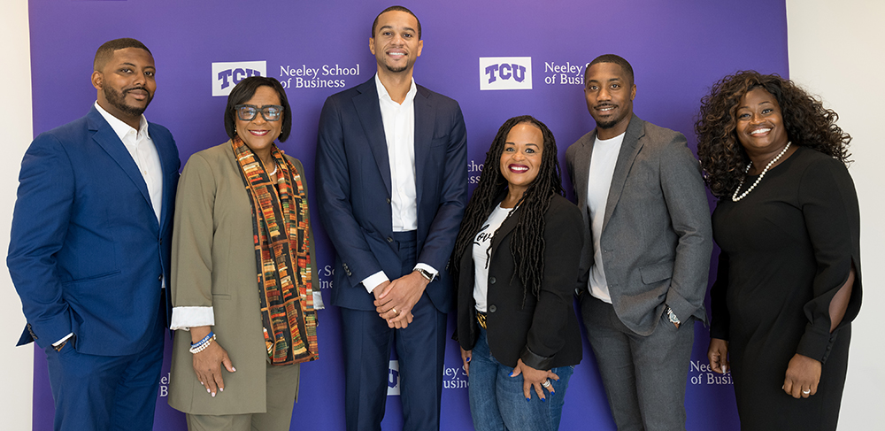 Sekou Lewis with the members of the Board