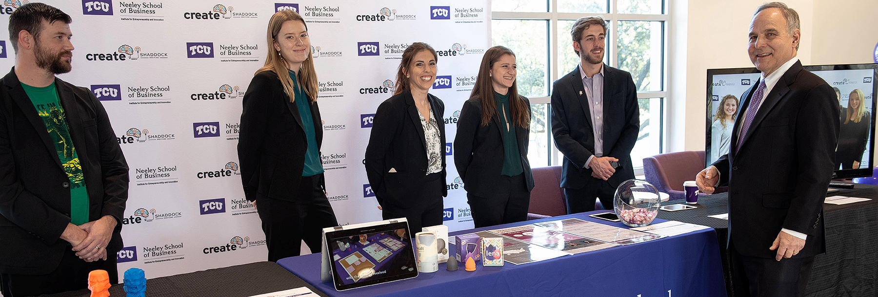 Section Image: Bill Shaddock with student entrepreneurs from CREATE 