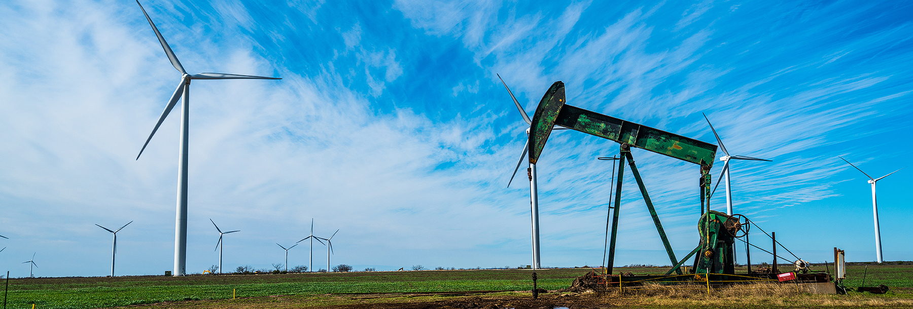 Section Image: windmills and oil derrick 