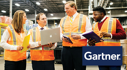 Section Image: Supply Chain students in a wearhouse; in a lobby 