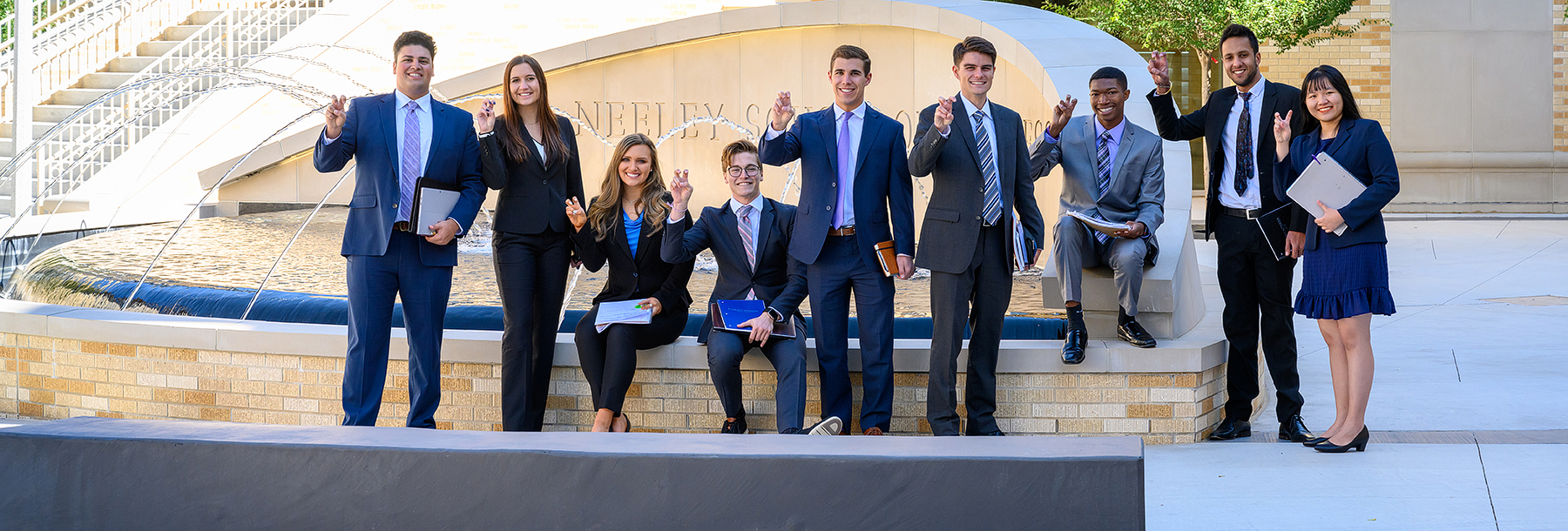 Section Image: Undergraduate students in front of the Neeley fountain 