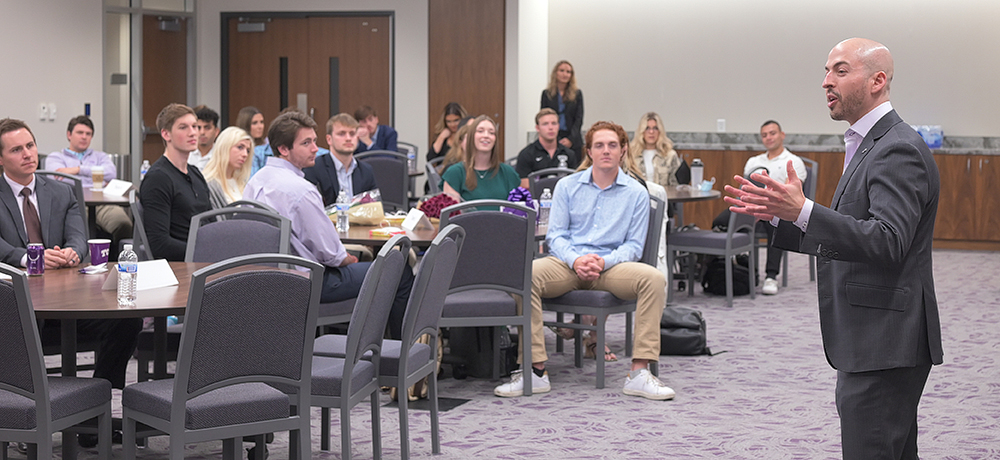 Brandon Chicotsky presenting in the banquet room