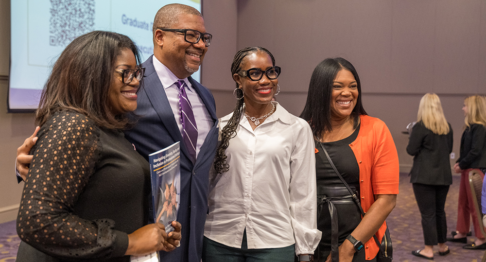 Ken Bouyer poses with attendees