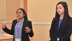 Two girls presenting