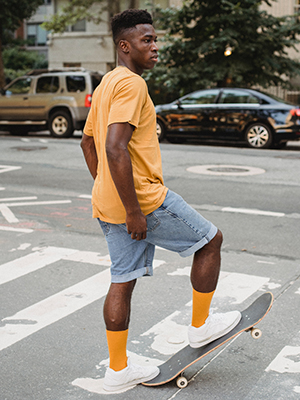 Man on skateboard in shorts