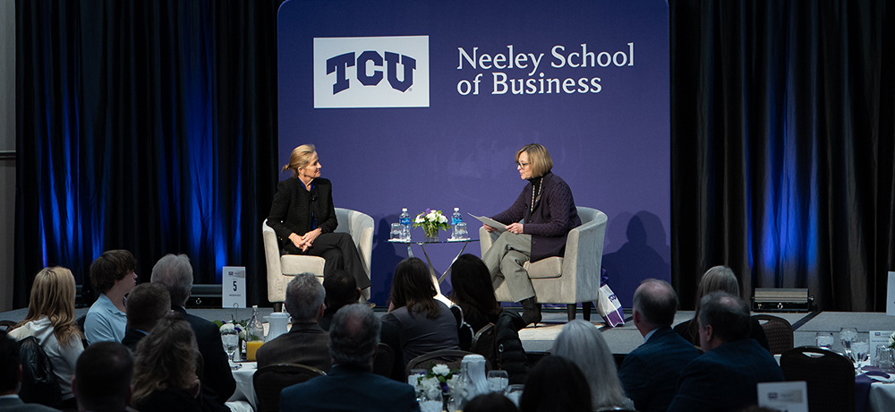 Elaine Paul and Hettie Richardson on stage in the BLUU ballroom