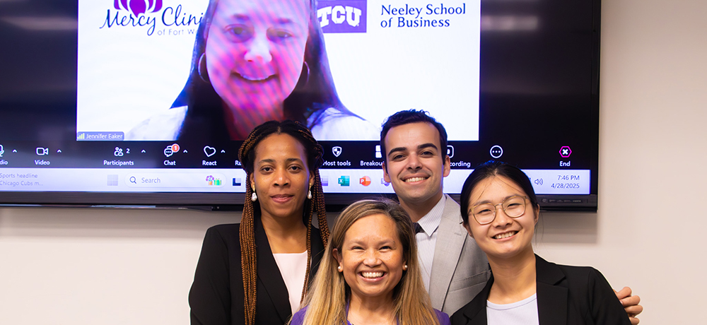 Section Image: Neeley MBA students with frogs up 