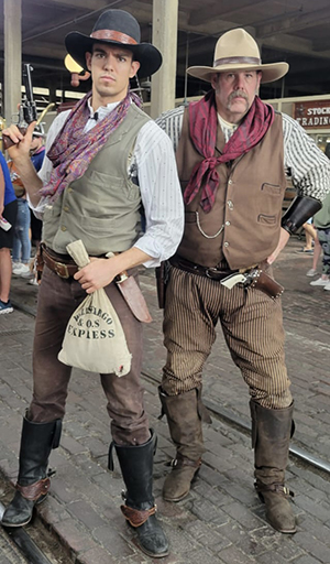 Brendan Hartman with fellow cowboy actor in the Fort Worth Stockyards