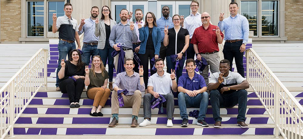 Energy students in the steps of the library