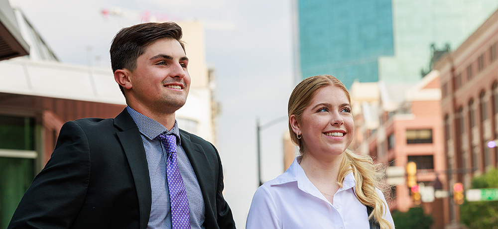 Section Image: Two students in suits on the streets of Fort Worth 