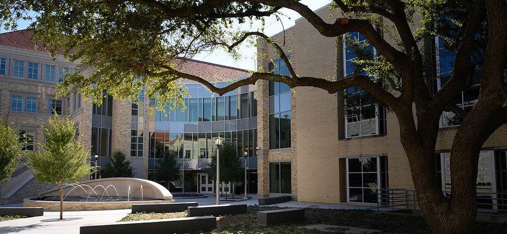 Section Image: Student looking out the window of Smith Hall 