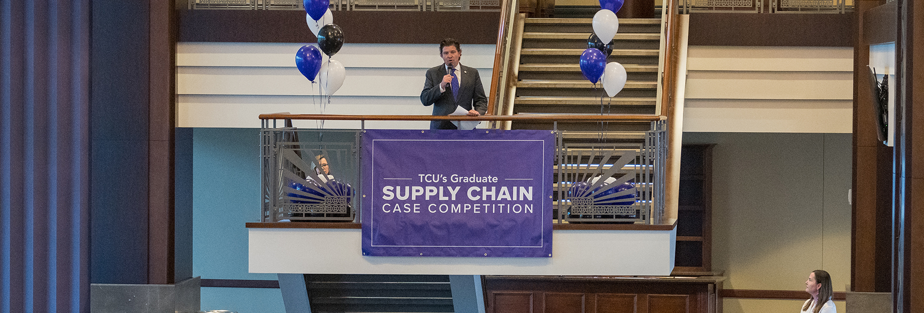 Section Image: TCU President Pullin addresses the crowd from the balcony 