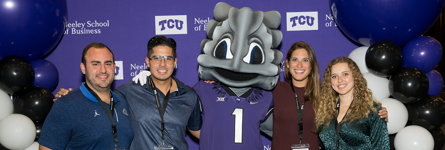 Section Image: Team poses with SuperFrog 