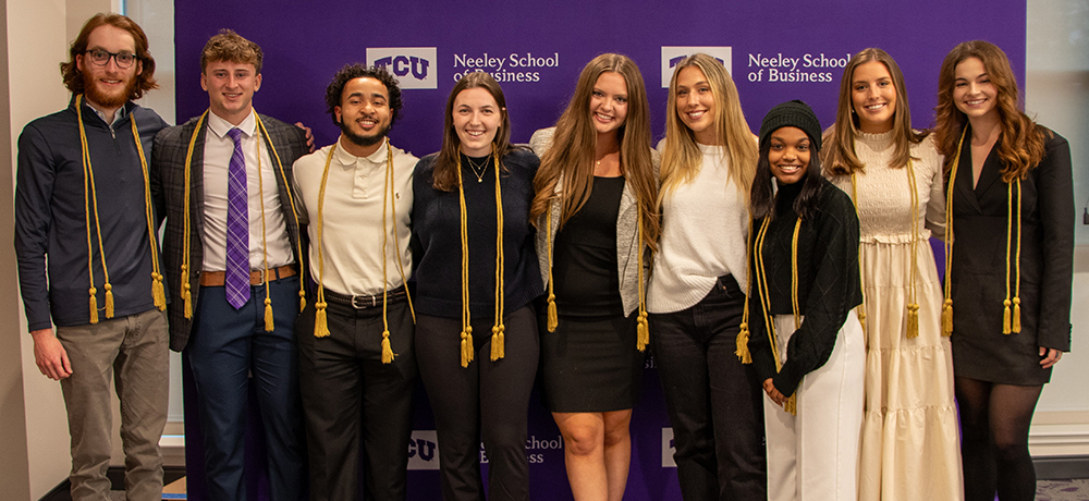 Group of Neeley Complete graduates with their cords.