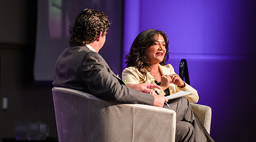 Section Image: Daniel Pullin and Nina Vaca on the stage at the Tandy Executive Speaker Series 