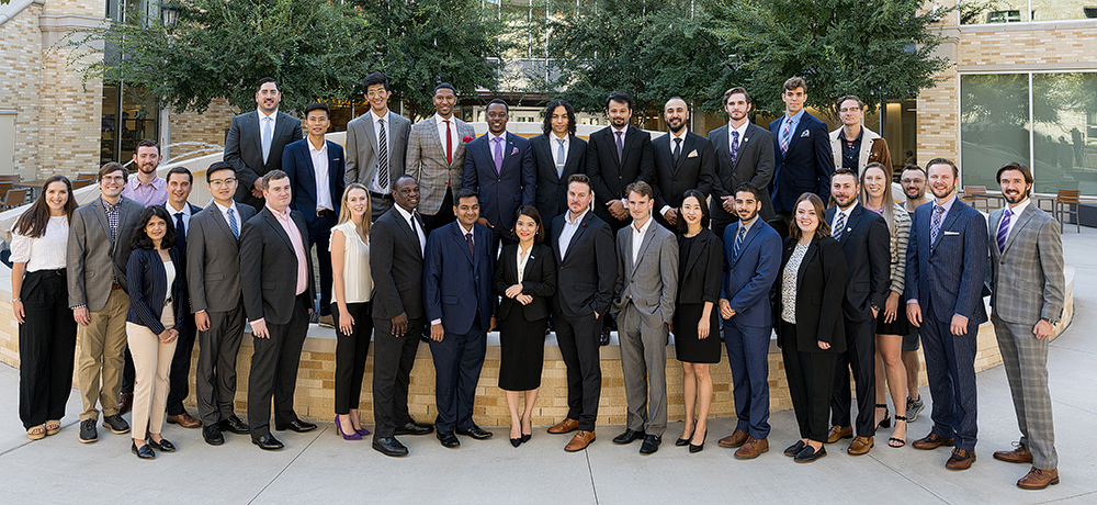 Section Image: Group of full-time MBA students post on the Neeley Fountain 