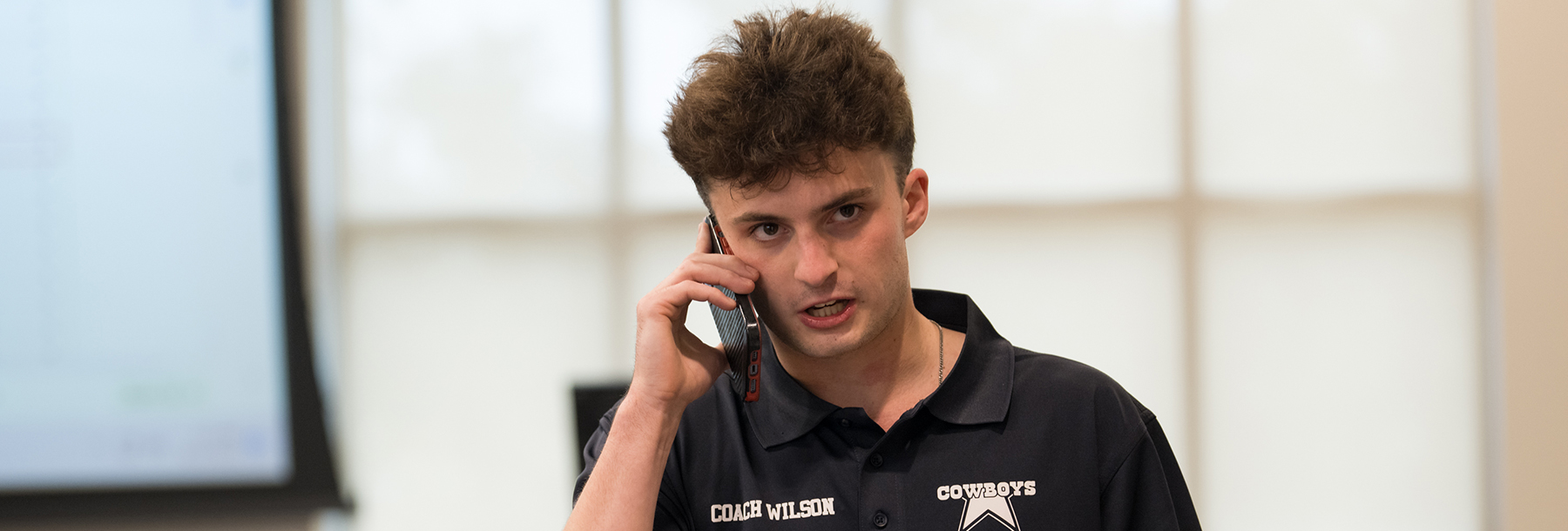 Section Image: Student on the phone 