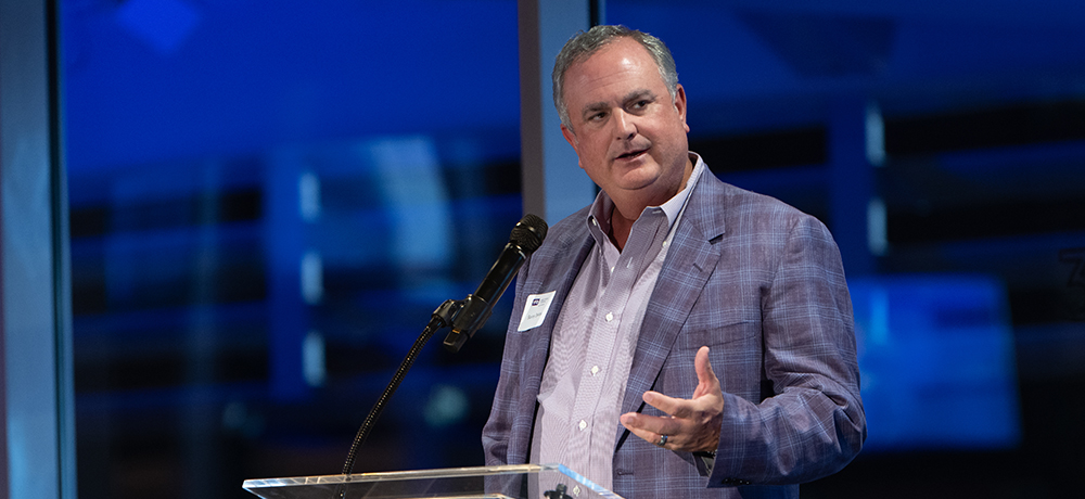 TCU Football Coach Sonny Dykes addresses the Legends in Energy attendees
