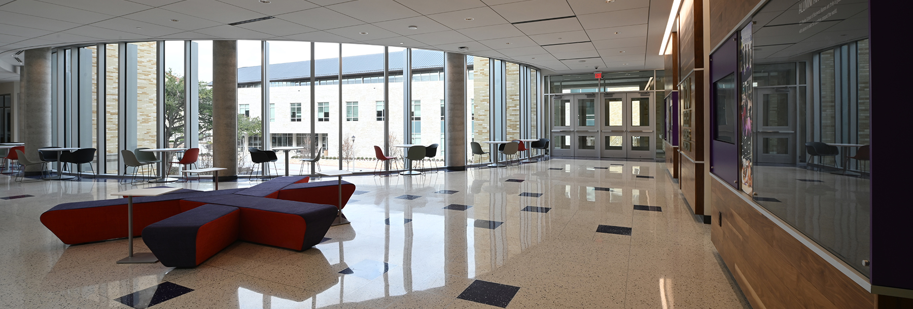 Section Image: Curved windows and seating in the Rogers Rotunda 