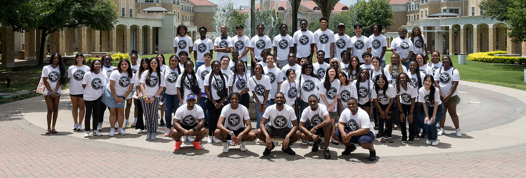 Section Image: Group of ACAP students pose at Frog Fountain 