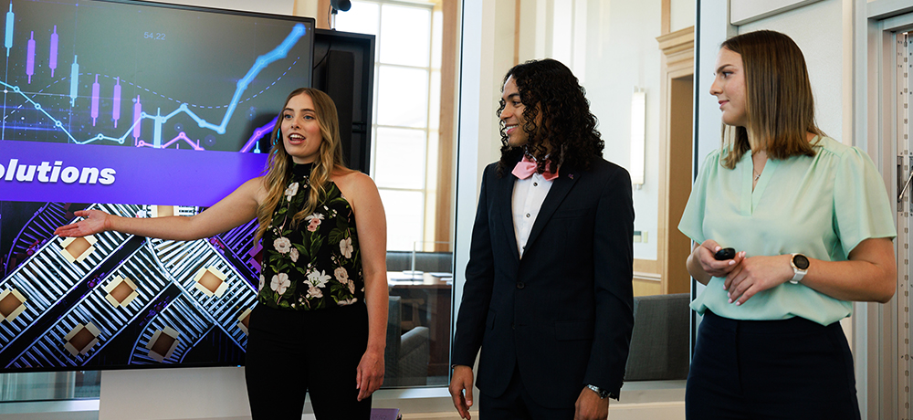 Group of students presenting in the Rees Jones Incubator Lab