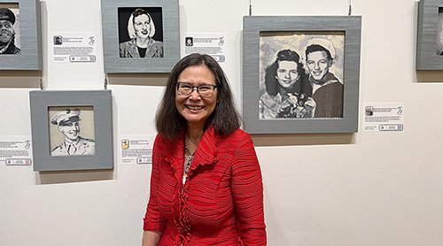Section Image: Maureen Kenney in front of her bead art exhibit at the Dross Heritage and Culture Center 
