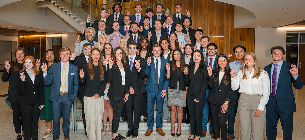 Section Image: Graduate students on the Grand Stairs in the Rogers Rotunda 