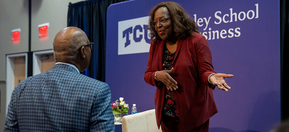 Sandra Taylor addressing an audience member