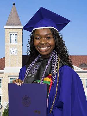 Haley Freeney in cap and gown with diploma