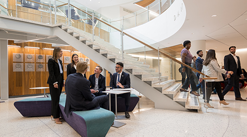 Rogers Rotunda with students walking 