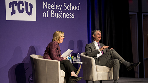 Section Image: Hettie Richardson and Grant Moise on stage in the BLUU ballroom for the TESS breakfast 