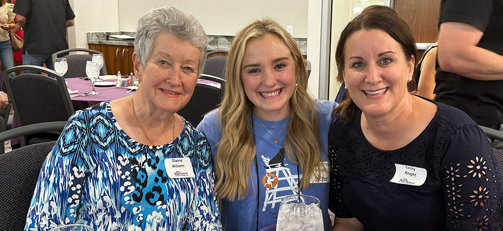 Ellie with her mom and grandmother