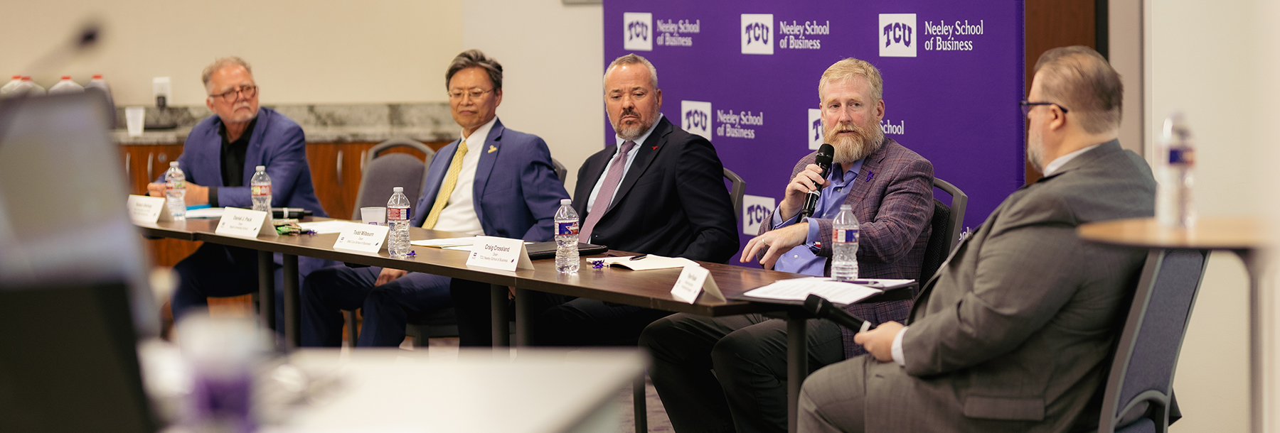 Section Image: Panel of presenters at the Summit 