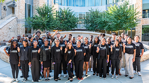 ACAP group in front of the Neeley Fountain
