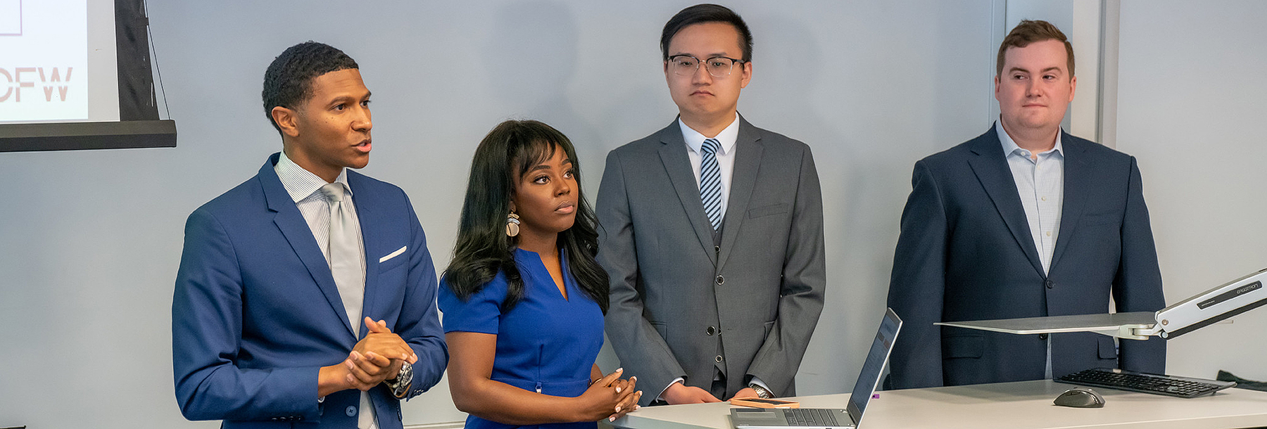 Section Image: Graduate students presenting 