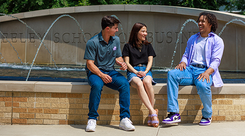 Group of TCU Students on Neeley fountain