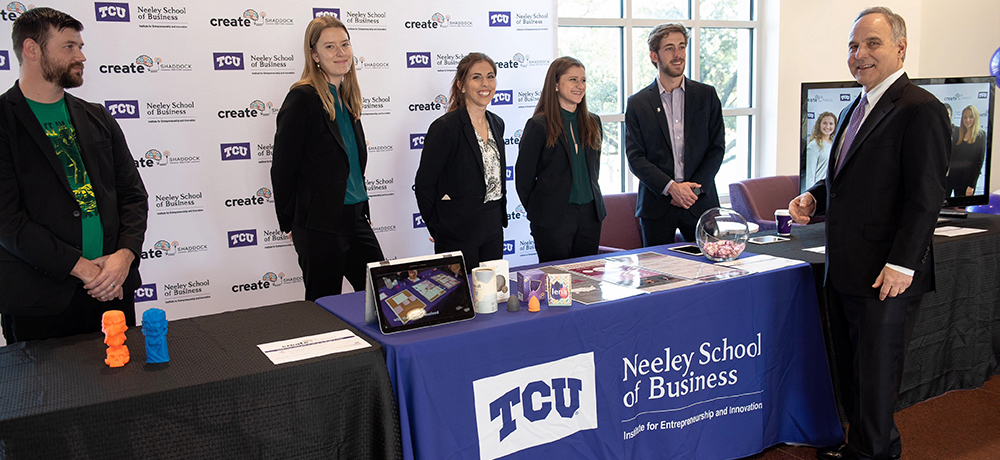 Section Image: Bill Shaddock with student entrepreneurs 